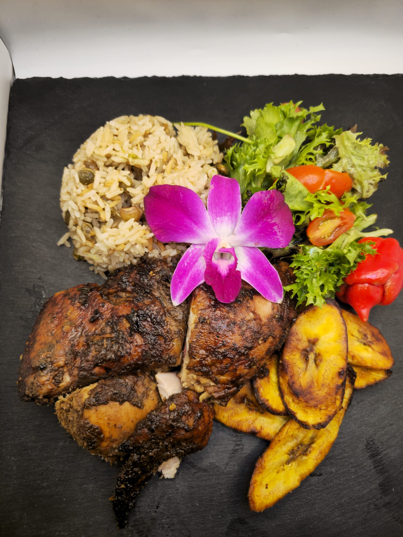 Jerk Chicken and Rice and peas